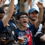 Supporters watch the PSG Inter Milan Match in Grands Boulevards - Paris