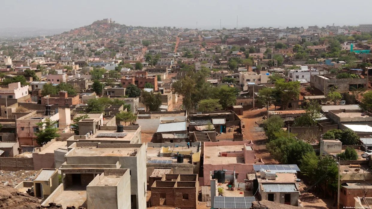 Aerial view of a blocked highway near Bamako with visible barricades