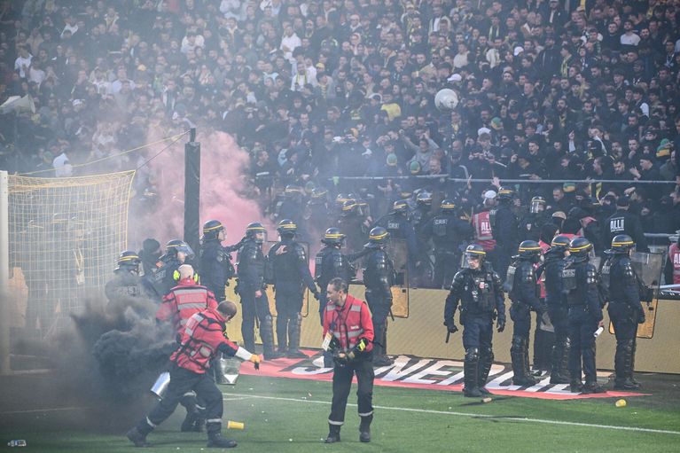 Supporters return to stands under heavy police presence