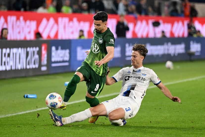 Wolfsburg players in action against Paderborn