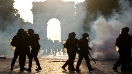 CRS police officers on the Champs-Élysées during PSG’s Champions League final celebrations, Paris, May 30, 2026