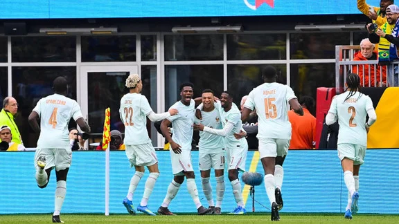 Ibrahima Konaté and Kylian Mbappé celebrating