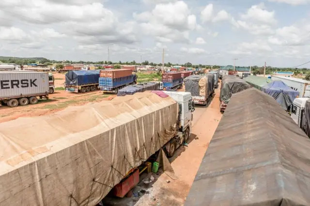 Long queues of trucks stranded at the closed Benin-Niger border in Malanville