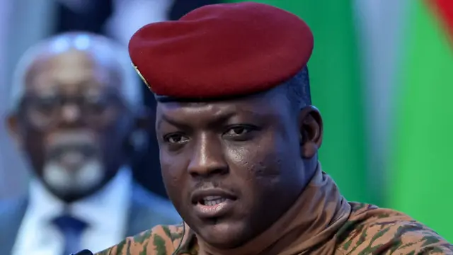 Close-up of Ibrahim Traoré in military uniform with a red beret