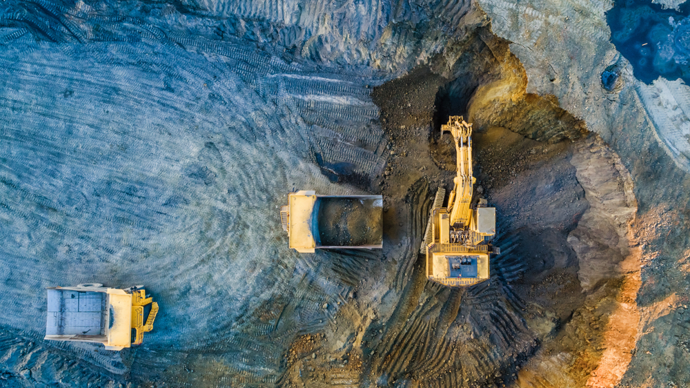 Quarry,Mining,,Work,Of,The,Excavator,And,Dump,Trucks,,Photo
